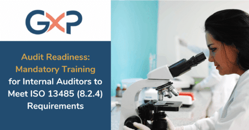 A group of professionals in a lab setting receiving mandatory training to become ISO 13485 internal auditors.